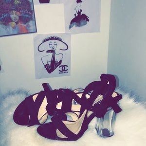 Black clear heels shoes.